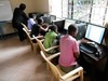 Girls learning computer